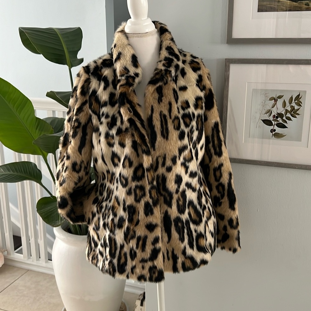 Animal print faux fur jacket by Donna Salyers.